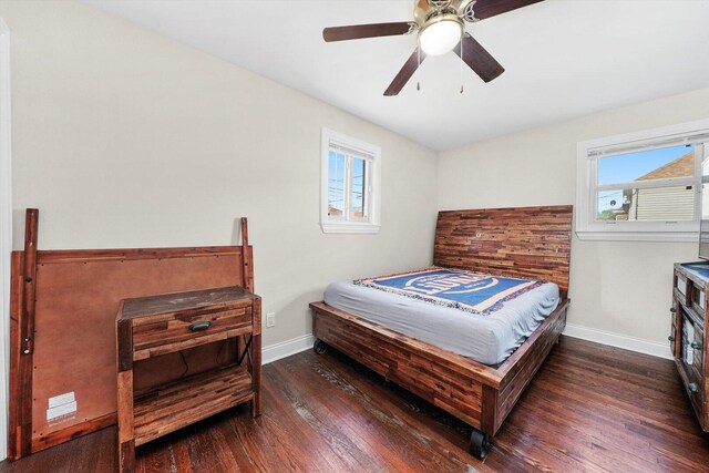 457 E 91st St, Chicago, IL 60619 - bedroom featuring baseboards, wood finished floors, and a ceiling fan