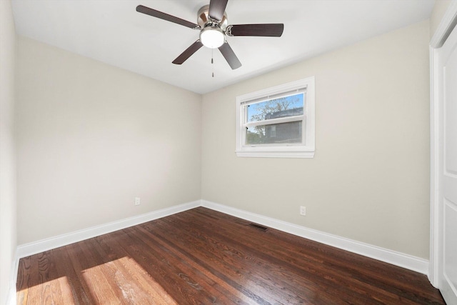 457 E 91st St, Chicago, IL 60619 - unfurnished room with baseboards, dark wood-style flooring, and ceiling fan