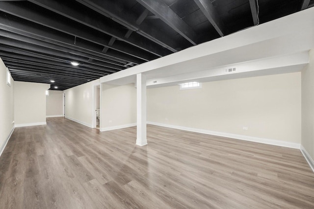 457 E 91st St, Chicago, IL 60619 - basement with light wood-style flooring and baseboards