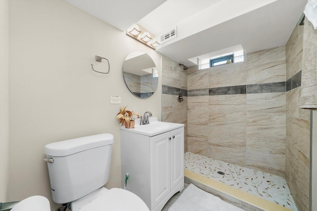 457 E 91st St, Chicago, IL 60619 - bathroom with toilet, tiled shower, and vanity