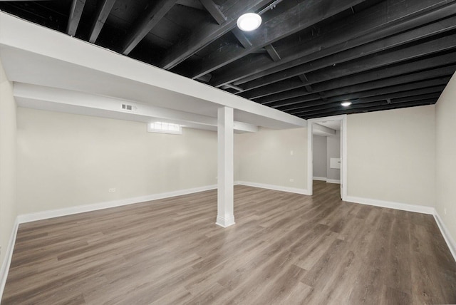 457 E 91st St, Chicago, IL 60619 - basement with wood finished floors and baseboards