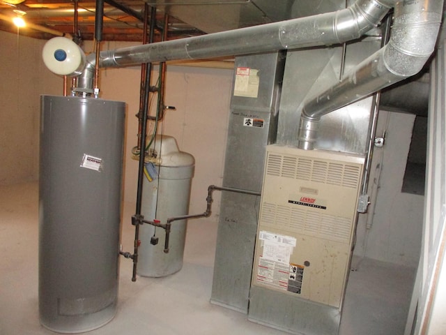 utility room with gas water heater