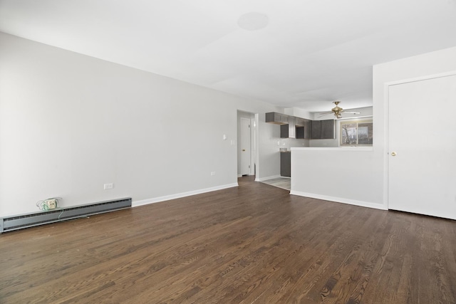 unfurnished living room featuring a baseboard radiator, baseboards, dark wood finished floors, and a ceiling fan