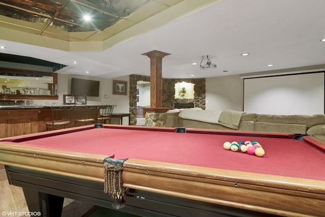 playroom with billiards, wood finished floors, ornate columns, indoor wet bar, and recessed lighting