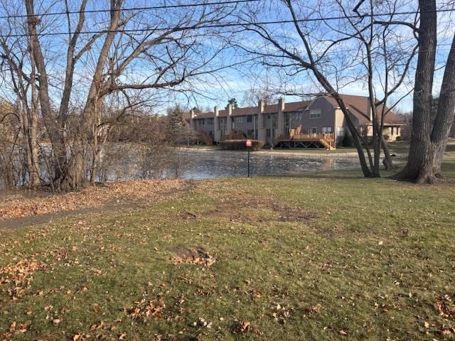 view of yard with a water view