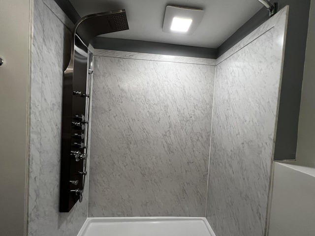 bathroom featuring a shower