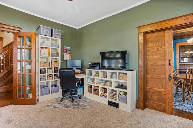 carpeted office with ornamental molding