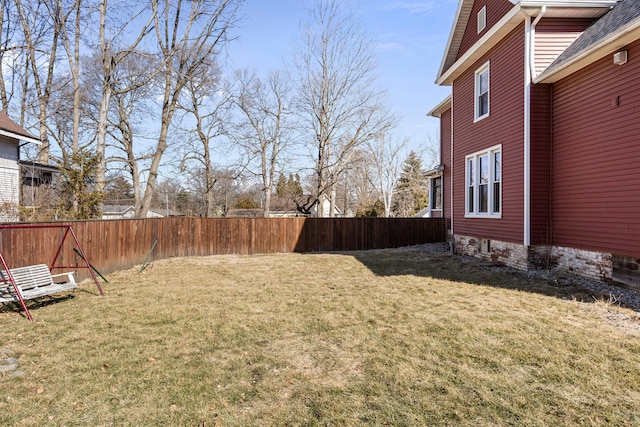 view of yard featuring a fenced backyard