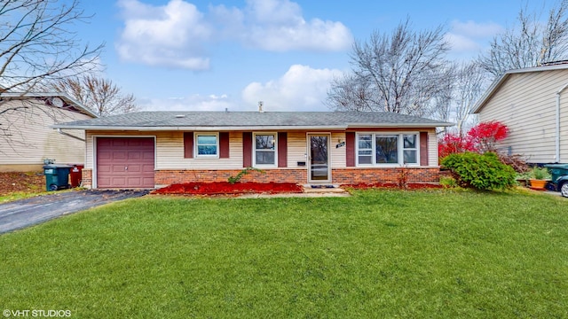 single story home featuring an attached garage, a front lawn, aphalt driveway, and brick siding