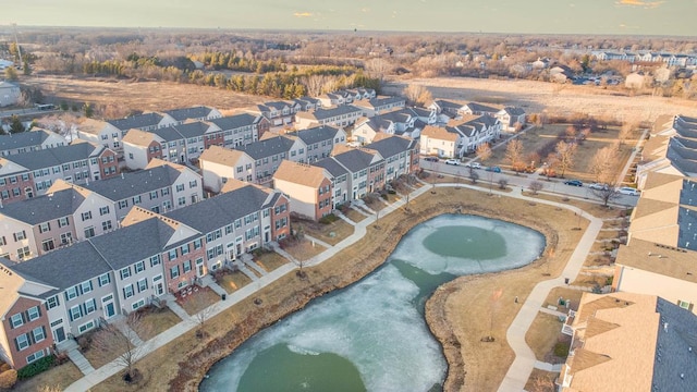 birds eye view of property with a residential view