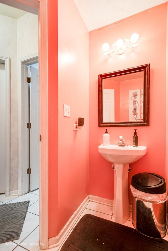 bathroom featuring tile patterned flooring and baseboards