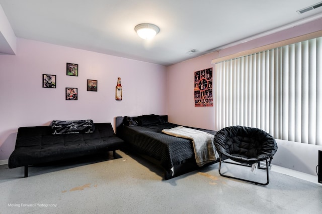 bedroom featuring visible vents