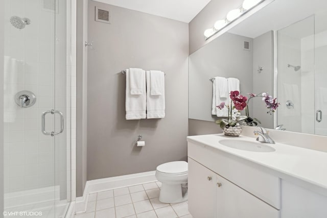 bathroom with visible vents, a shower stall, baseboards, and tile patterned floors