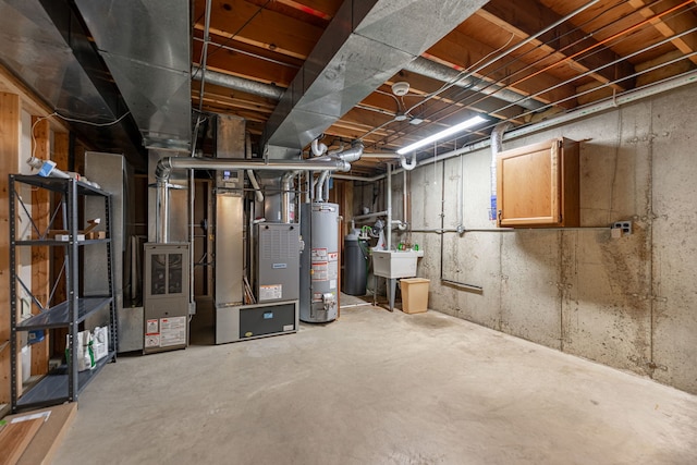 unfinished basement with heating unit, a sink, and gas water heater