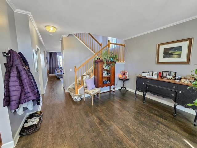 interior space featuring dark wood-style floors, ornamental molding, and baseboards