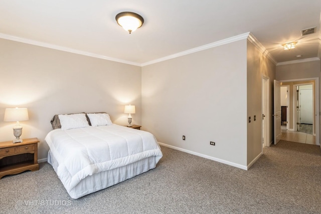 carpeted bedroom featuring ornamental molding, visible vents, and baseboards