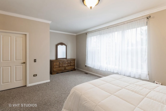 bedroom featuring ornamental molding, carpet flooring, and baseboards