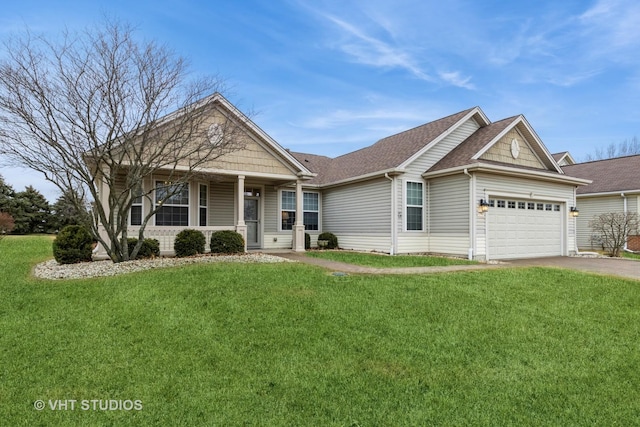 view of front of home with driveway, a garage, a front lawn, and roof with shingles