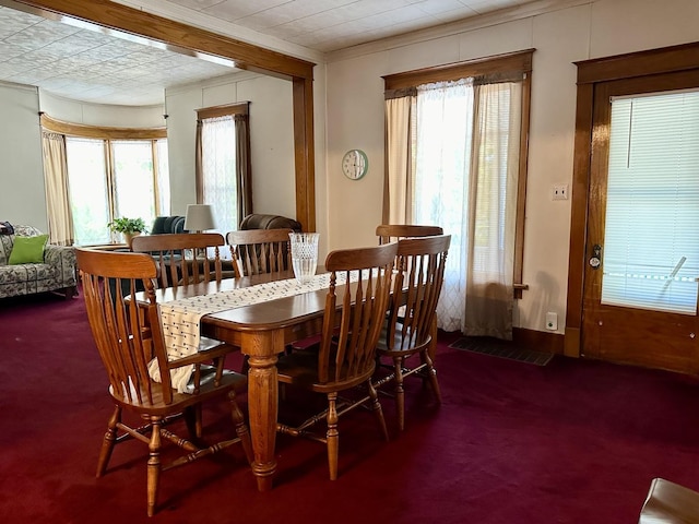 view of carpeted dining room