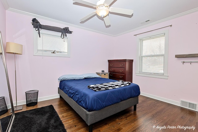 bedroom featuring ornamental molding and visible vents