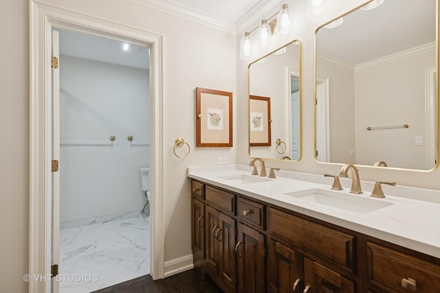 full bathroom with ornamental molding, marble finish floor, and a sink