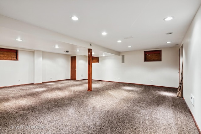 finished basement with carpet floors, baseboards, and recessed lighting