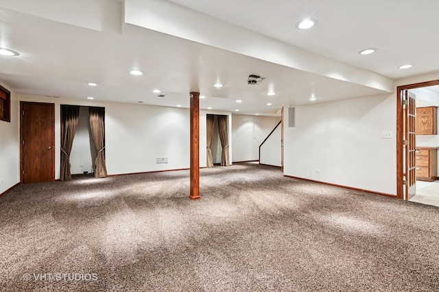 finished below grade area featuring carpet, baseboards, and recessed lighting