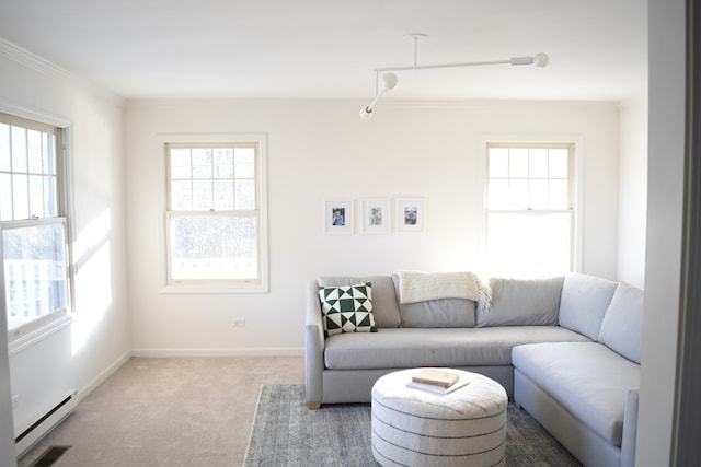 living room with crown molding, a baseboard radiator, visible vents, carpet flooring, and baseboards