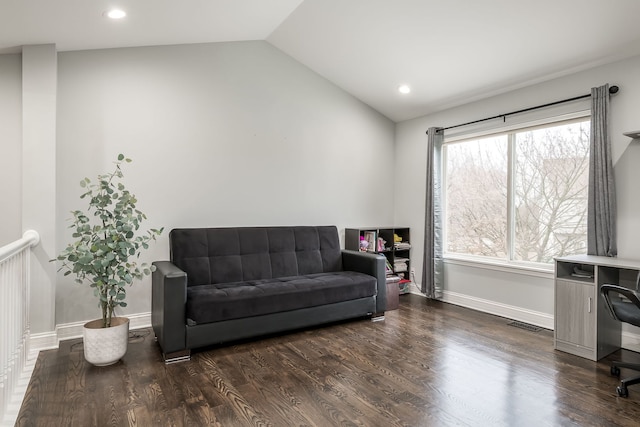 sitting room featuring lofted ceiling, recessed lighting, dark wood-type flooring, visible vents, and baseboards