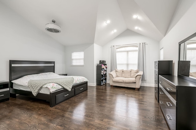 bedroom with lofted ceiling, baseboards, and dark wood finished floors