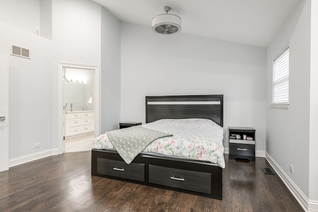 bedroom with dark wood-type flooring, visible vents, and baseboards