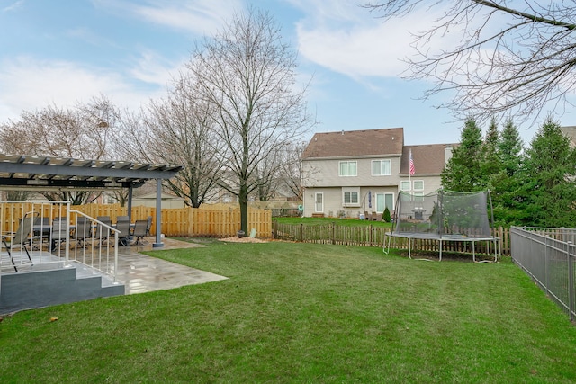 view of yard featuring a pergola, a fenced backyard, a trampoline, a patio area, and a playground