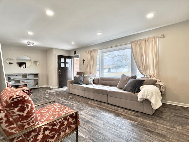 living area featuring recessed lighting, wood finished floors, and baseboards