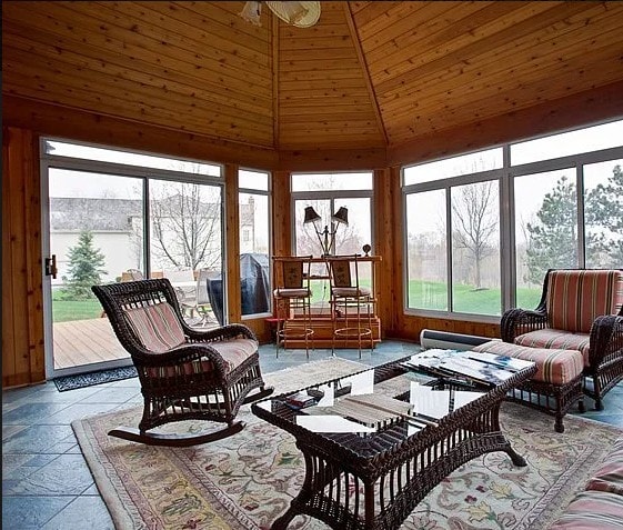 sunroom / solarium with vaulted ceiling and wooden ceiling