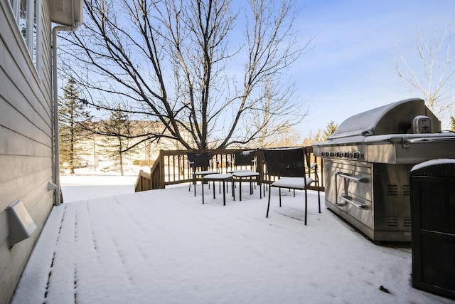 view of snow covered deck