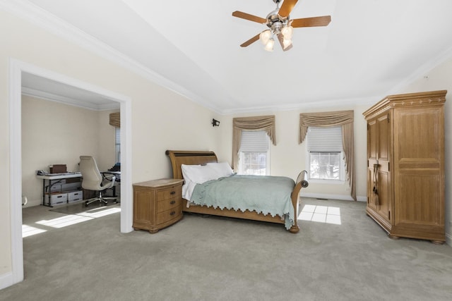 bedroom with light carpet, baseboards, a ceiling fan, and crown molding