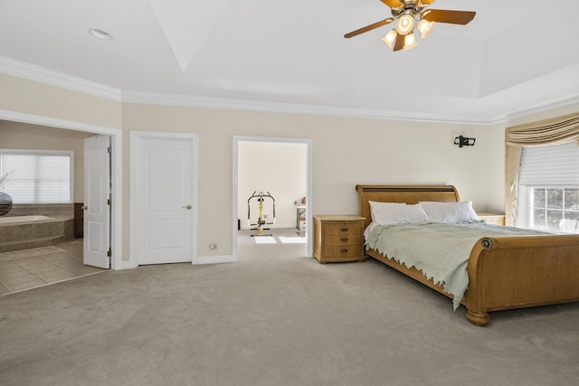 carpeted bedroom featuring ensuite bathroom, ceiling fan, ornamental molding, and baseboards