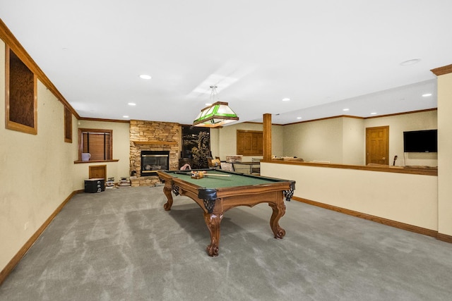 game room featuring carpet floors, crown molding, recessed lighting, a stone fireplace, and baseboards