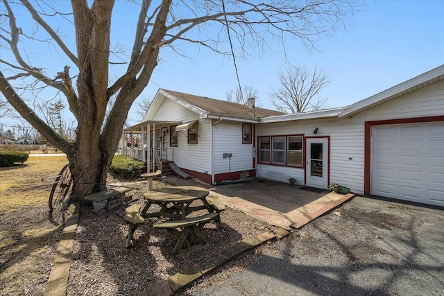 exterior space featuring a garage