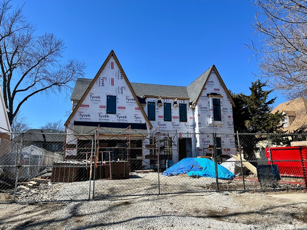 view of front of property with fence