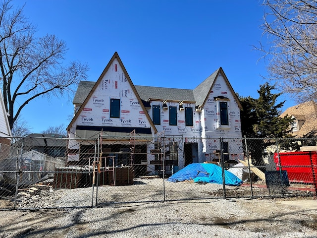 view of front of property with fence