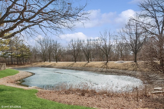 exterior space with a water view