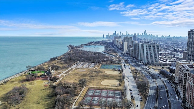 aerial view featuring a view of city and a water view