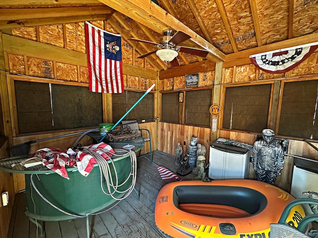 interior space featuring vaulted ceiling and ceiling fan