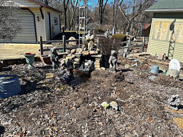 view of yard with a garage