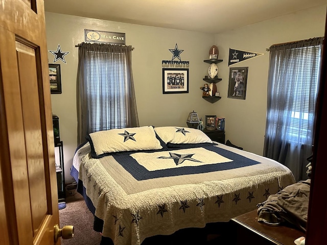 bedroom featuring carpet