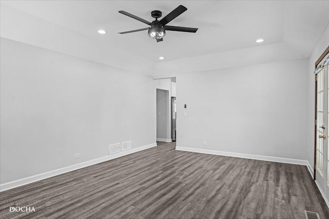 unfurnished bedroom with recessed lighting, dark wood-style flooring, visible vents, and baseboards