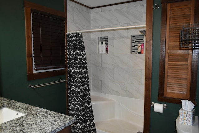 bathroom with toilet, a shower with shower curtain, and vanity