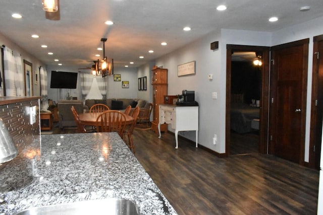 kitchen with ceiling fan, baseboards, dark wood-style flooring, and recessed lighting