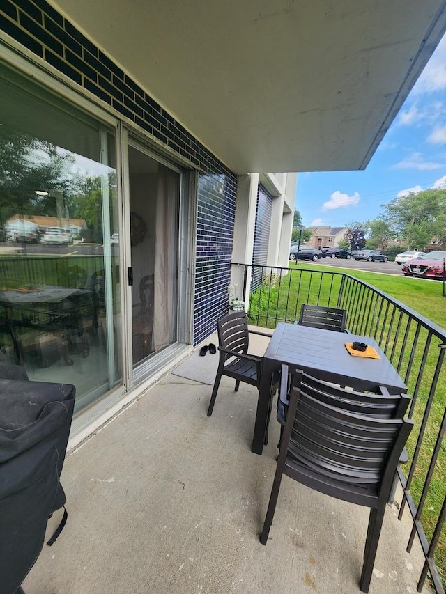 balcony featuring a sunroom